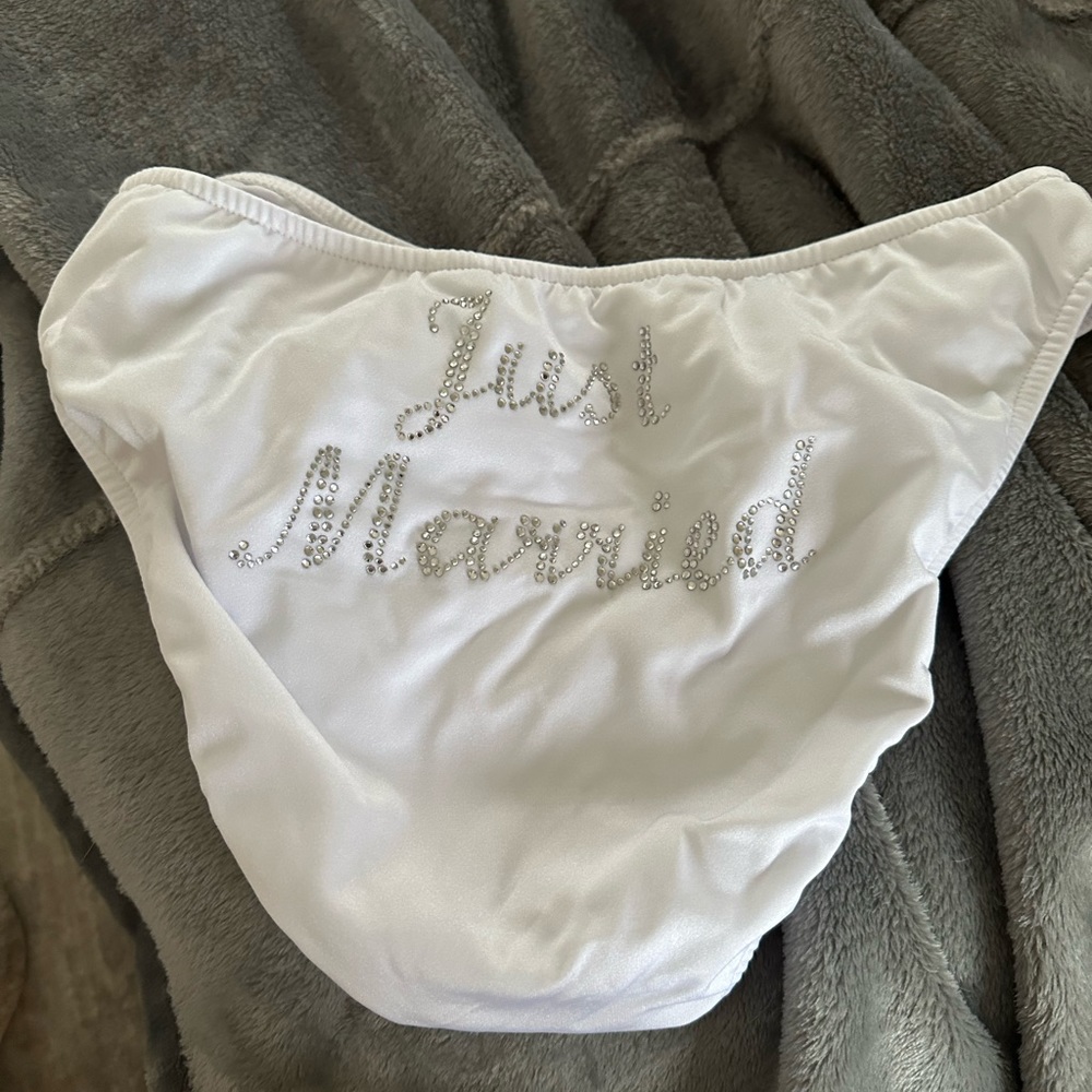 Brand new! Just married swimsuit bottom in white. Size 8/medium.